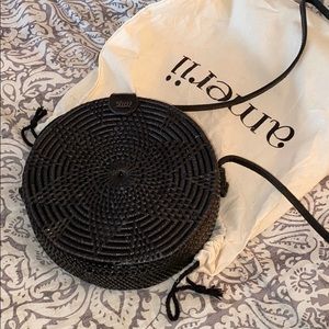 Black rattan purse. Never worn